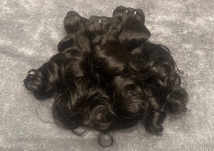 Bundles of human hair natural  natural loose  curl plied together