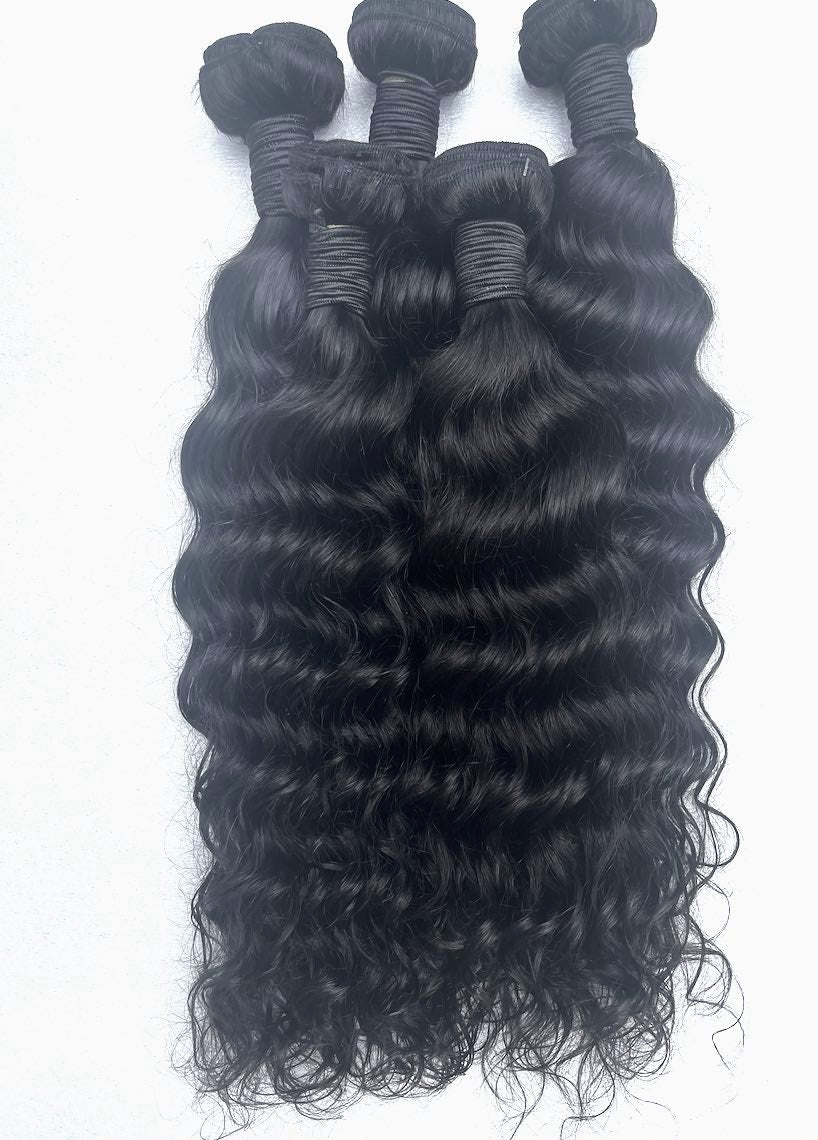 4  bundle packs of Brazillian Natural wavy Human Hair